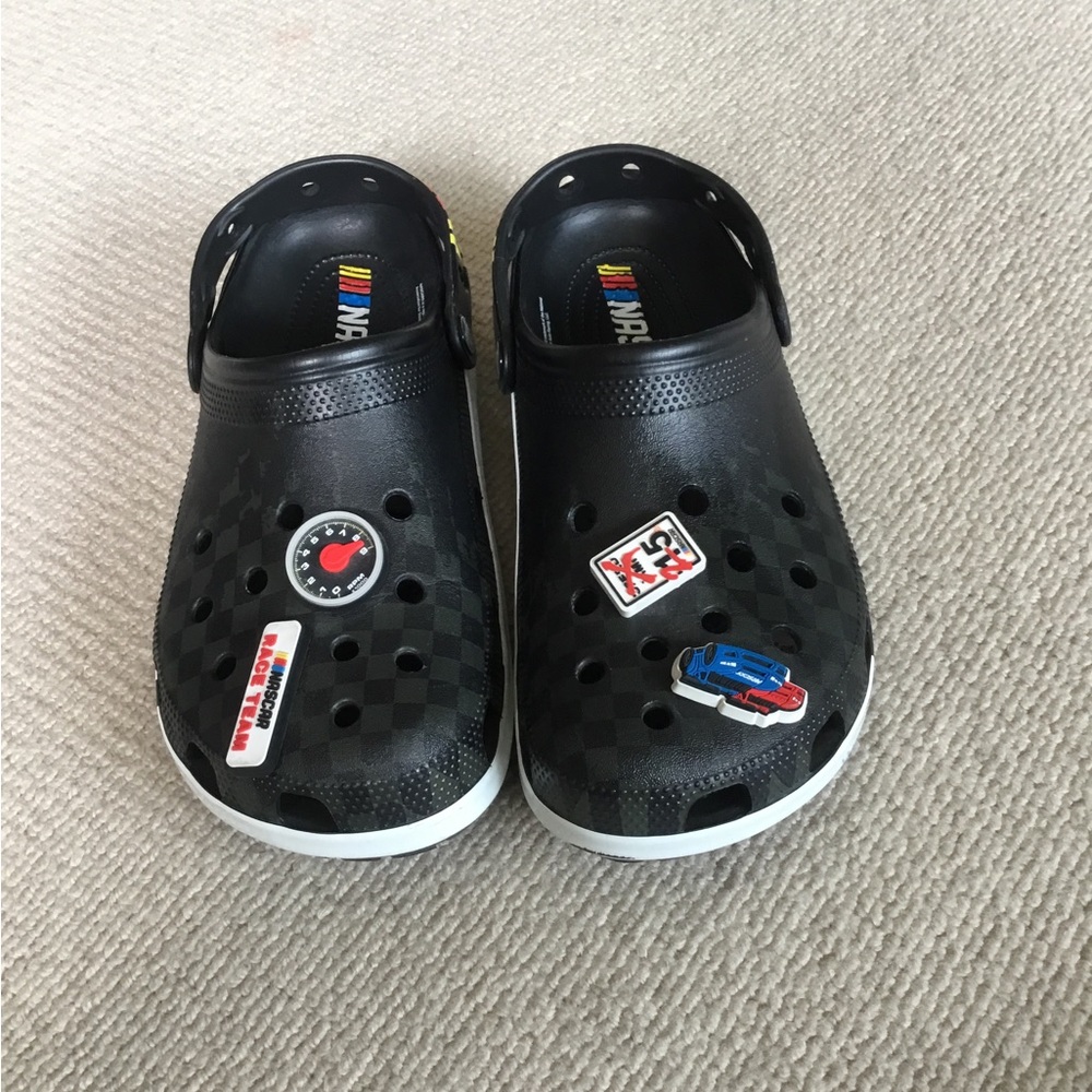 CROCS Black Slip-On Clogs with Racing Charms size 10 Mens 12 woman’s
